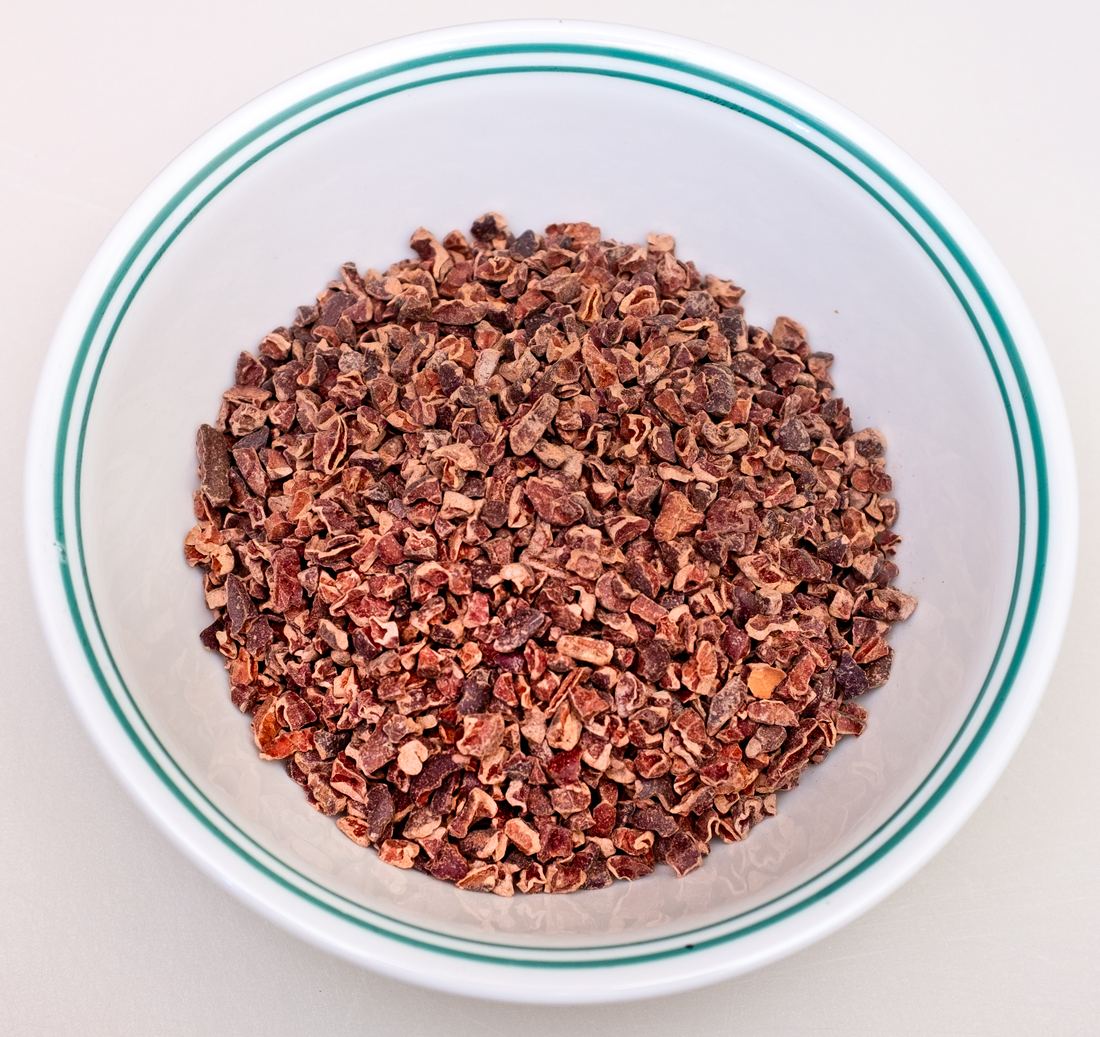 A bowl of crunchy roasted cocoa nibs